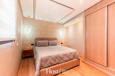 a bedroom with a bed in a room at Give Essalam Design & Patio & Clim & 2P in Casablanca