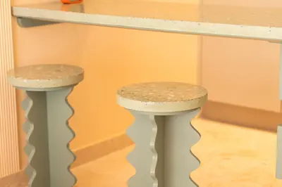 two stools sitting under a counter in a kitchen at Résidence Terre de Lys in Casablanca