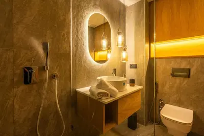 a bathroom with a sink and a shower and a toilet at Studio chic & moderne - Les Princesses - Parking in Casablanca