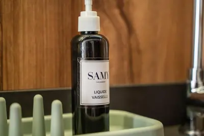 a bottle of santacist liquid on a table at Résidence Happy Living in Casablanca
