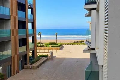 a view of the beach from a building at Maya Suites - Anfa Place - Sea View in Casablanca