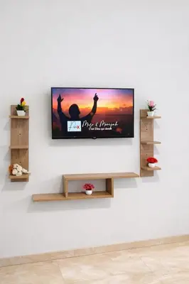 a flat screen tv hanging on a wall at Appart luxe in Rabat