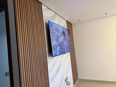 a painting on a wall in a room at luxury apartment in the city center in Rabat