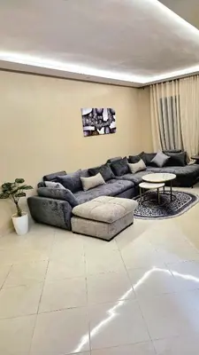 a living room with a couch and a table at Casa Downtown Modern Studio in Casablanca