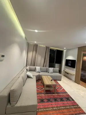 a living room with a couch and a coffee table at Anfaflore2 in Casablanca