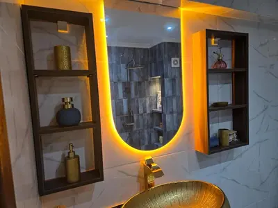 a bathroom with a sink and a mirror at Corniche in Casablanca