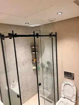 a shower stall in a bathroom with a toilet at Apartment for rent in the heart of Casablanca in Maarif