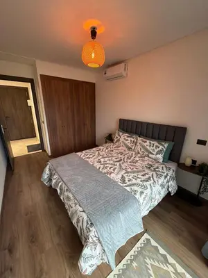 a bedroom with a large bed in a room at Studio for rent couple in Casablanca