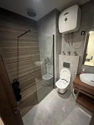 a bathroom with a shower and a toilet and a sink at Studio for rent couple in Casablanca