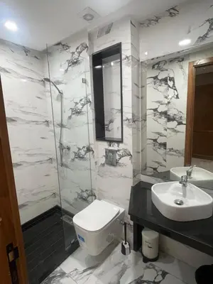 a bathroom with a toilet and a sink at Studio cosy au coeur de casa - propre et sécurisé in Casablanca