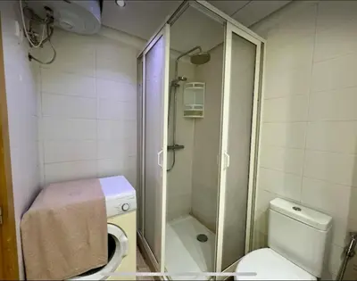 a small bathroom with a shower and a toilet at Anfa City in Casablanca