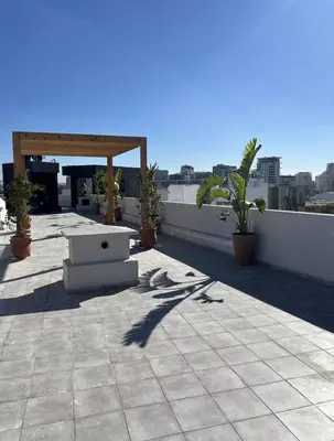 a laptop computer sitting on top of a roof at Chic Studio I Anfa Park & CFC I Gym Wifi & Parking in Casablanca