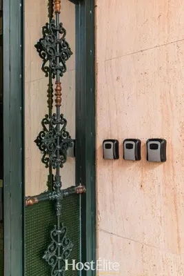 a cross on the side of a building with a window at Exceptional Private Room 2 SandRose in Casablanca