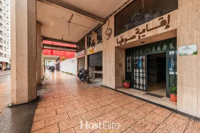 an empty sidewalk in front of a building at Exceptional Private Room 2 SandRose in Casablanca