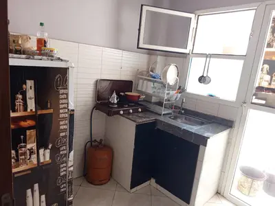 a small kitchen with a stove and a sink at Téranga imm in Casablanca