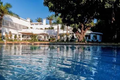 a large swimming pool in front of a hotel at Le Sphinx Boutique Hôtel in Mohammedia