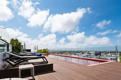 a balcony with a view of a harbor at Domo Casablanca in Casablanca