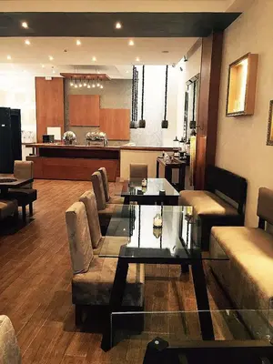 a living room with a couch and a table at The Seven Hotel in Casablanca