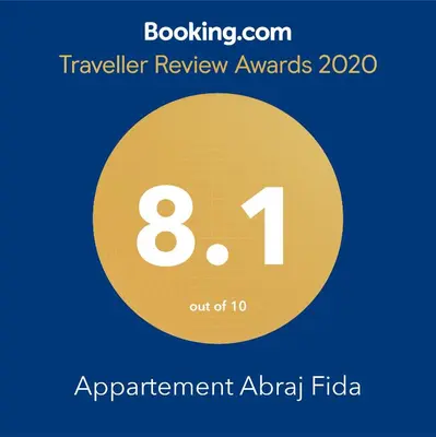 a yellow circle with the text eighteen and the number eight at Appartement ,Tram Parking and wifi gratui in Casablanca