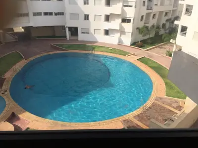 a large swimming pool in the middle of a building at DaliMAR in Bouznika