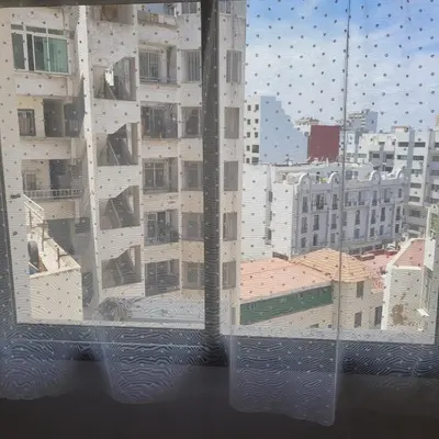 a view of a city from a window at Cozy Studio in Casablanca , 1 km from Casavoyageurs station , Free parking in Casablanca