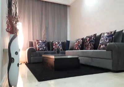 a living room with a couch and a coffee table at Horizon Home in Casablanca