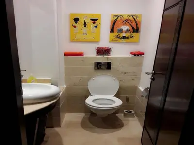 a bathroom with a toilet and a sink at Horizon Home in Casablanca