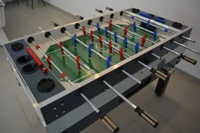a table with golf balls and bats on it at Ocean Park Hotel, Premium Suites & Wellness in Casablanca