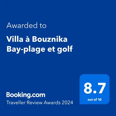 a screenshot of a cell phone with the text awarded to villa a boulevard at Villa à Bouznika Bay-plage et golf in Bouznika