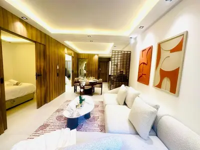 a living room with a couch and a table at Calm&cosy appart very well located in Casablanca