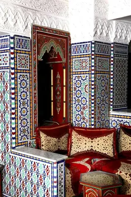 a room with a wall covered in colorful tiles at Hotel Moroccan House Casablanca in Casablanca
