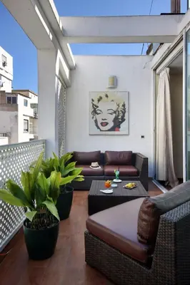 a living room with a couch and a table at Park Suites Hotel Luxury Boutique Hotel in Casablanca