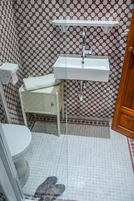 a bathroom with a sink and a toilet at Appartement moderne moroccan/African décoration in Casablanca
