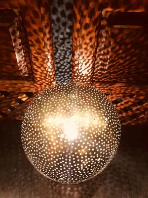 a chandelier hanging from a ceiling in a room at La Villa Mandarine in Rabat