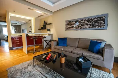 a living room with a couch and a table at Gray Boutique Hotel Casablanca in Casablanca