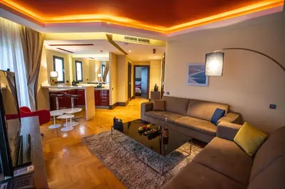a living room with a couch and a table at Gray Boutique Hotel Casablanca in Casablanca