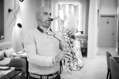 a man playing a saxophone in a room at Gray Boutique Hotel Casablanca in Casablanca