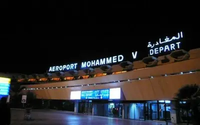 a large building with a sign on top of it at Nouaceur Garden Comfort and Serenity Casa Airport in Nouaseur
