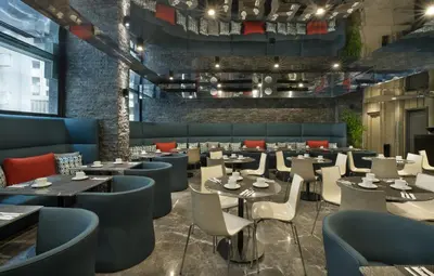 a restaurant dining room with tables and chairs at ODYSSEE Boutique Hotel Casablanca in Casablanca