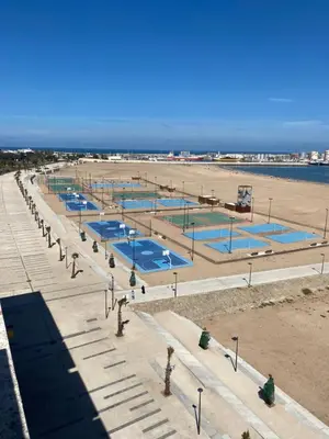 an overhead view of a beach with several swimming pools at Appartement Cosy - Corniche plage Mohammedia in Mohammedia