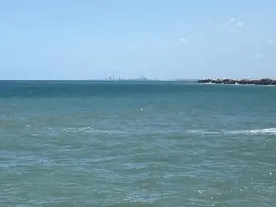 a large body of water with an island in the distance at Appartement Casa-marina au 10ème étage in Casablanca