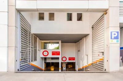 an entrance to a building with a parking garage at Kyriad Residence Casablanca in Casablanca
