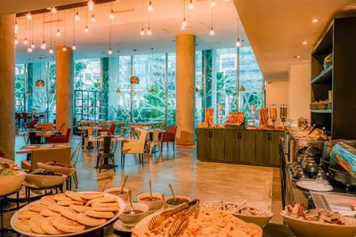 a restaurant with a bunch of food on display at Campanile Casablanca Centre Ville in Casablanca