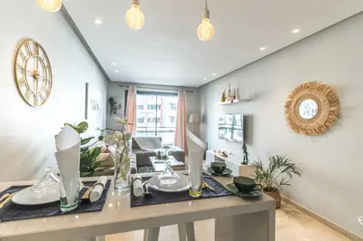 a living room with a table with a mirror at COMFORTABLE & ELEGANT FLAT IN A LIVELY PLACE by ShortstayMaroc in Casablanca