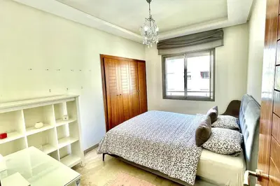 a bedroom with a bed and a window at Taj nouaceur aéroport Mohamed V in Nouaseur
