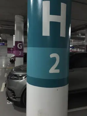 a parking meter in a parking garage with a car at luxury apartment in Marina Casablanca in Casablanca