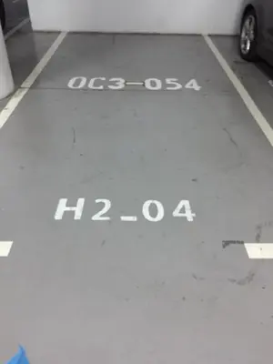a parking lot with the word ogasota written on it at luxury apartment in Marina Casablanca in Casablanca