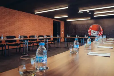 a row of bottles of water sitting on a table at ONOMO Hotel Casablanca Sidi Maarouf in Casablanca