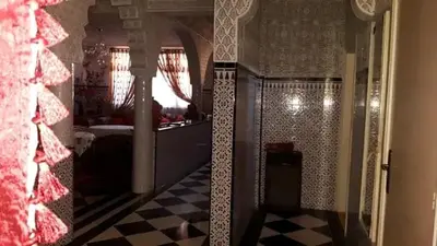 a bathroom with a christmas tree in a room at Riad Nabila in Casablanca