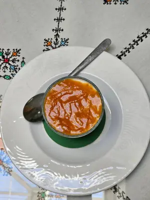 a bowl of soup on a plate with a spoon at Ryad 91 in Casablanca